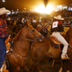 Participants of the 18th annual Bill Pickett Invitational Rodeo ride their horses at the start of the event July 21, 2001 in Los Angeles, CA.